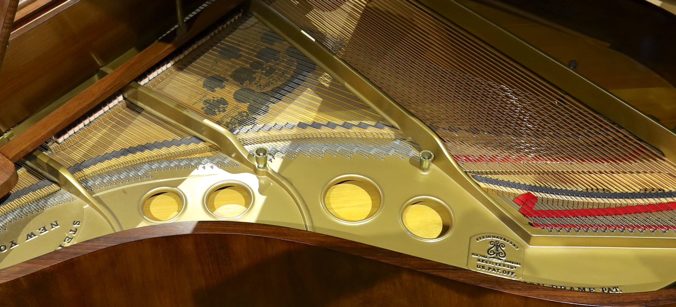 A Steinway & Sons of New York Patent Grand Construction mahogany cased piano, no.157302, width 148cm depth 180cm height 97cm